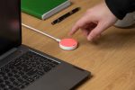 Luxafor mute button for microphone glowing red