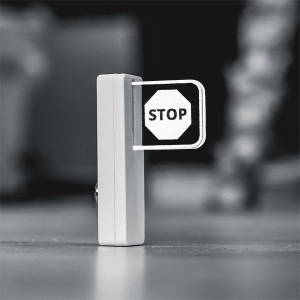 A Luxafor Colorblind Flag USB LED 'Do Not Disturb' light, available in a Stop Sign or Free mode, designed to eliminate distractions and indicate your availability status.